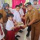 Camat Bunta Hadiri Launching Penyaluran MBG Sentuh 14 Sekolah 1006 Siswa